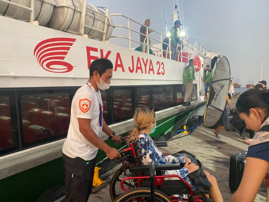 Medical evacuation team providing medical assistance for travelers in Indonesia at a remote site