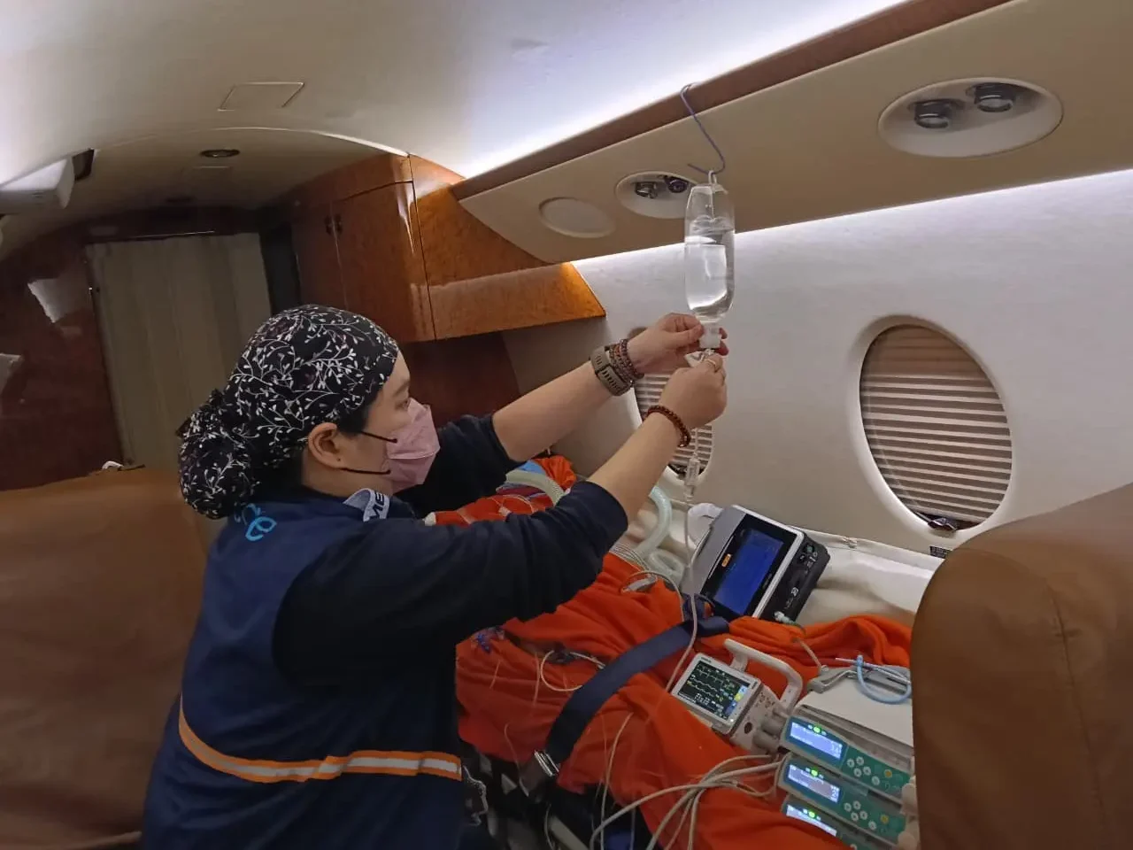 Air Ambulance Indonesia medical crew providing in-flight patient care