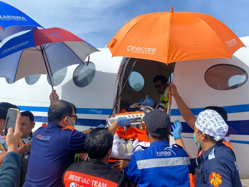 Indonesia medics team coordinating medical evacuation aircraft transfer